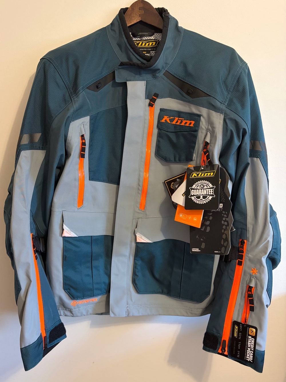 KLIM- NWT size large Carlsbad Jacket in the Petrol/Strike Orange colorway.